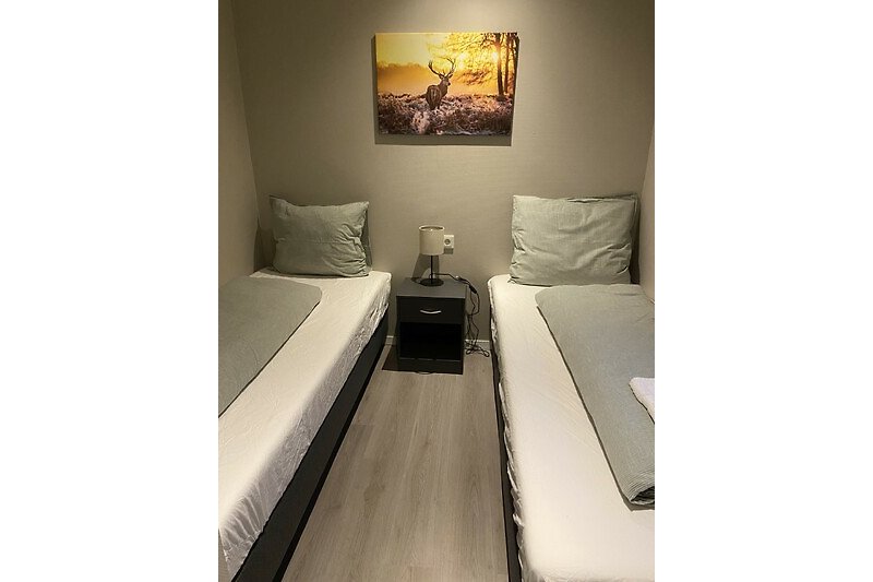 Slaapkamer met twee 1-persoonsbedden