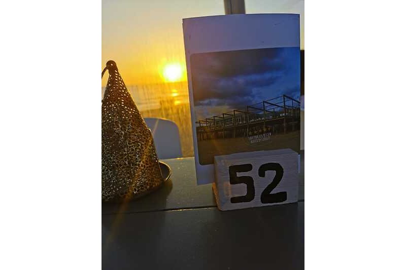 Sonnenuntergang im Strandrestaurant Paal 6 erleben