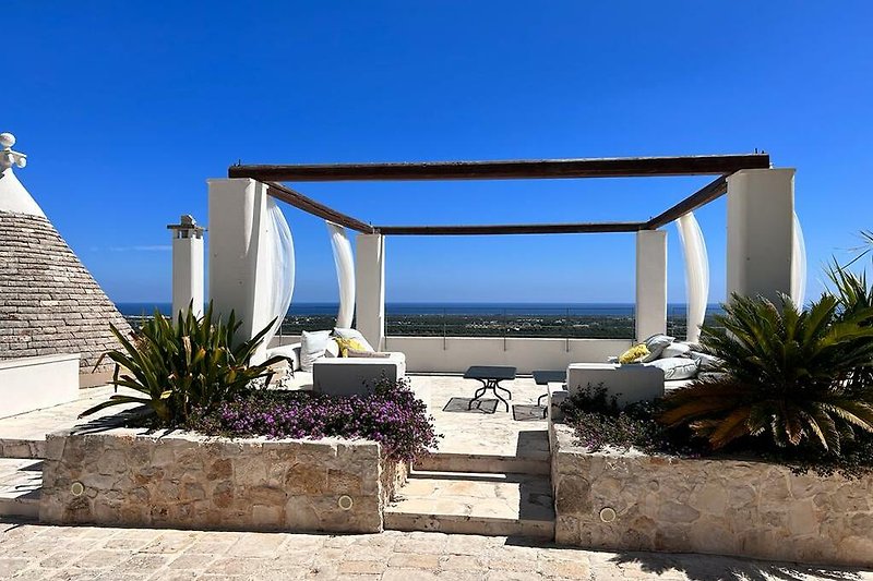 Beautiful outside lounge with panoramic views to the sea