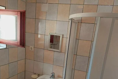 Apartments Tisno - Ein-Zimmer-Wohnung (links)