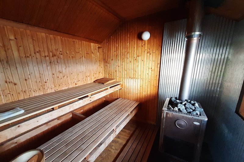 Cozy sauna room with sea location and view