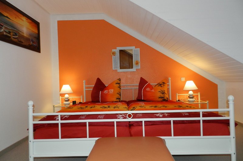 Elternschlafzimmer in der oberen Etage - Ehebett 180x200cm mit hochwertigen Matratzen für einen gesunden Schlaf