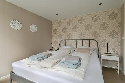 Ruime luxe 4 persoons Chalet midden op de Veluwe