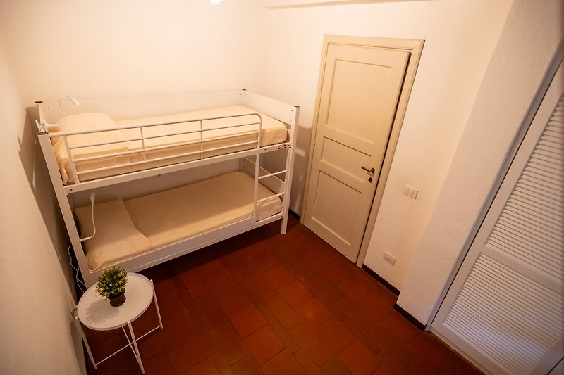 Schlafzimmer mit 1 Etagenbett.