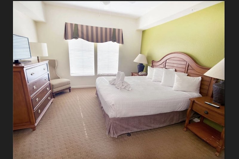 Experience the king bed in the master bedroom with beautiful sunlight.