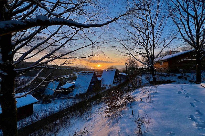 Sonnenuntergang im Winter - Blick vom Ferienhaus Casa Nana