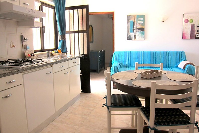Stylish kitchen with modern furniture and beautiful interior design.