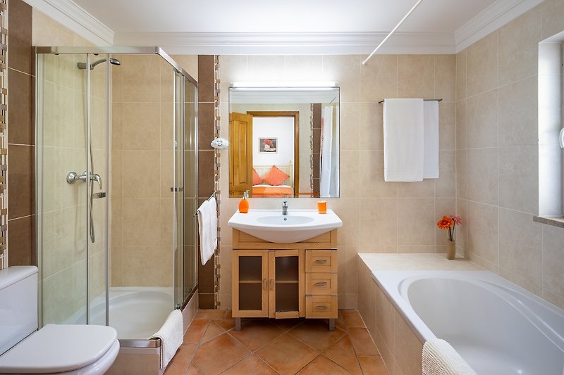 Luxurious bathroom with elegant bathtub and modern fixtures.