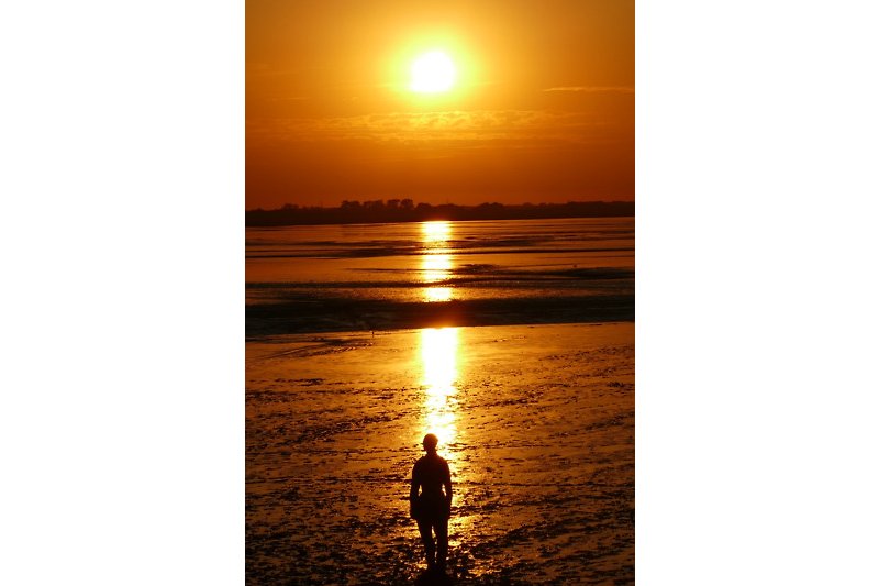 Ein atemberaubender Sonnenuntergang am Strand von Dangast