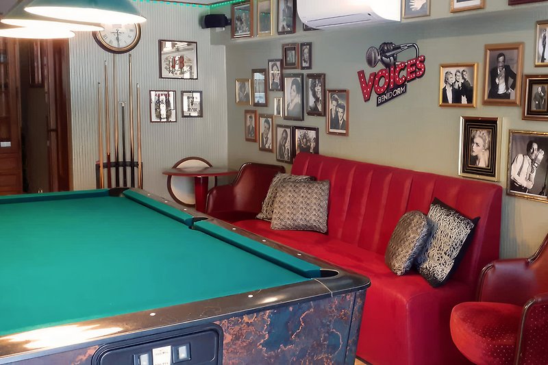 Karaoke bar with professional singing facilities and a full-size American pool table
