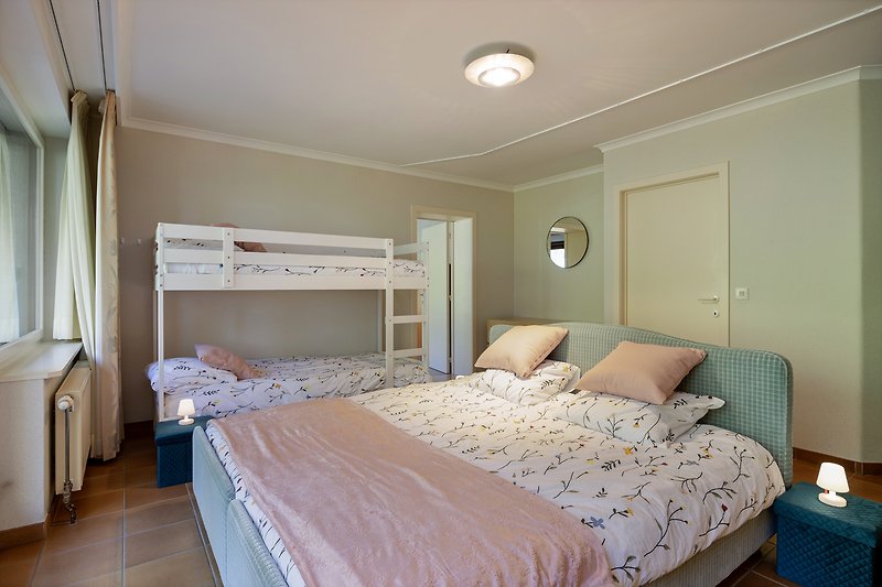Slaapkamers met opgemaakte bedden bij aankomst