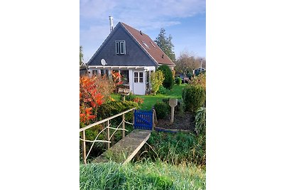 Grünes Haus mit Wintergarten