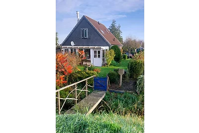 Grünes Haus mit Wintergarten