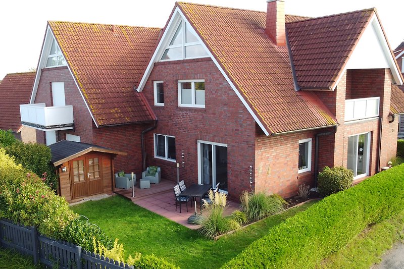 Charmante Ferienwohnung mit Garten und Terasse.