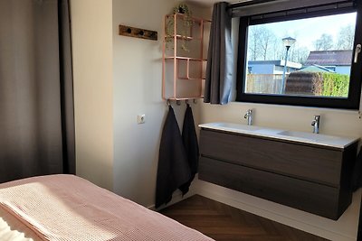 Tiny Zen House in Heinkenszand with private sauna, airco, outdoor swimming pool, WiFi and 2 bedrooms