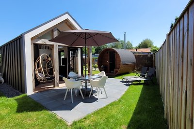 Tiny Zen House in Heinkenszand with private sauna, airco, outdoor swimming pool, WiFi and 2 bedrooms