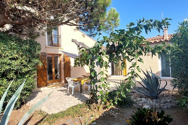 Casa affascinante con giardino.