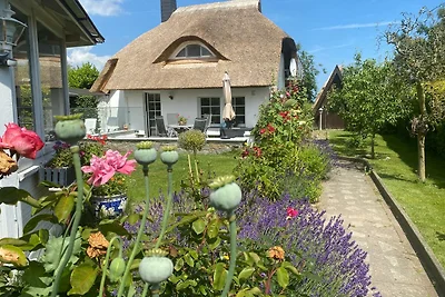 Reetdachhaus mit Wasserblick Garten und Kamin