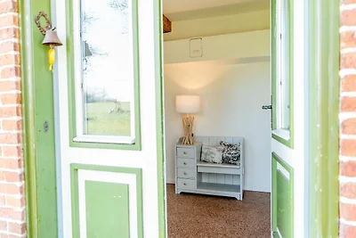 Ferienwohnung Teve im Reethus Mühlenlund