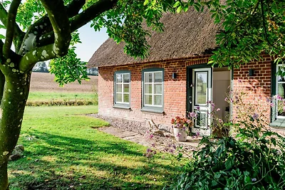 Ferienwohnung Teve im Reethus Mühlenlund