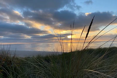 Sonnenuntergang am Strand in Vrouwenpolder Sonnenuntergang am Strand in Vrouwenpolder
