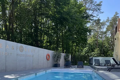 Private Ferienwohnung mit Küchenzeile und kostenlosem Parkplatz im Sea & Forest Resort: Pool, Sauna, Whirlpool