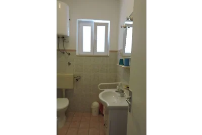 Appartamento Vacanza con famiglia Novalja