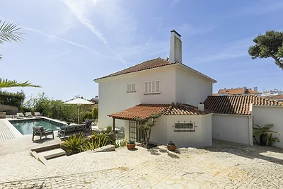 Estoril Contemporary Garden Villa by...