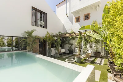 Brickstone Loft by Cadenzalux