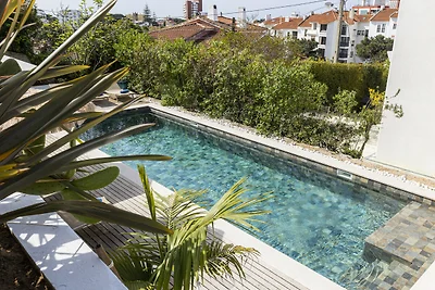 Estoril Contemporary Garden Villa by...