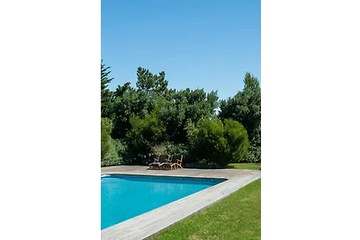 Garden Seaside Villa by CadenzaLux