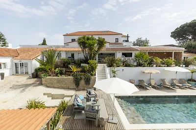 Estoril Contemporary Garden Villa by...