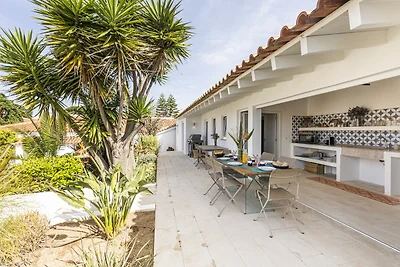 Estoril Contemporary Garden Villa by...