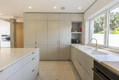 Contemporary Restelo Pool Haven by CadenzaLux