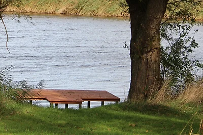 Reetdachhaus direkt am Wasser