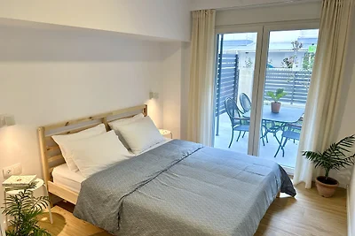 Modern Seaside Retreat with Private Patio and Parking