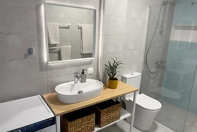 Modern Seaside Retreat with Private Patio and Parking