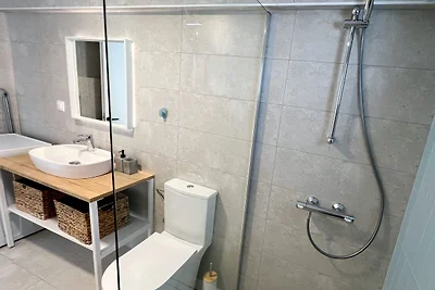 Modern Seaside Retreat with Private Patio and Parking