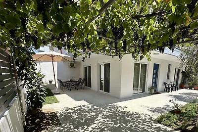 Modern Seaside Retreat with Private Patio and Parking