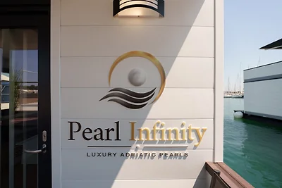 Pearl Infinity – Woonboot aan zee