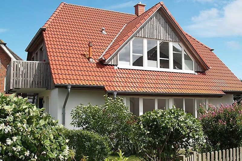 Uitzicht op tuin en paardenweide