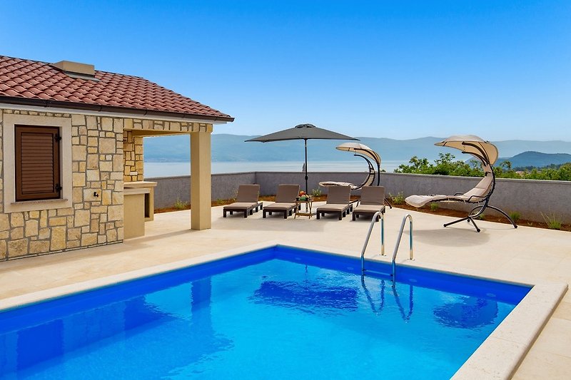 Villa Vista with a pool and sea view