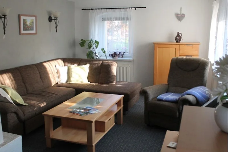 Die Wohnstube mit Schlafcouch