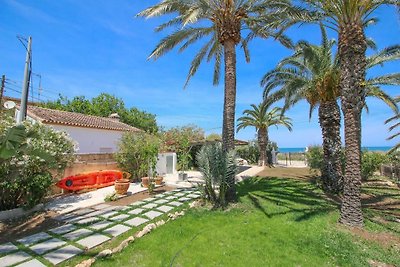 Villa in vorderster Strandlinie