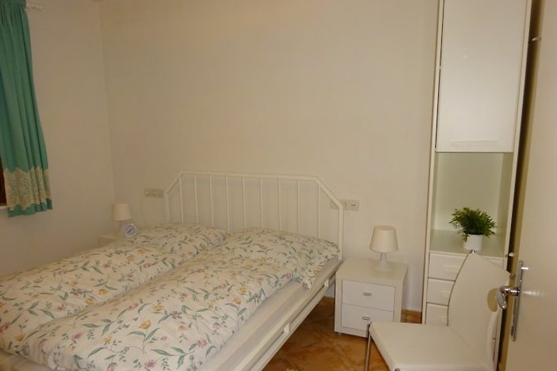 2. Dormitorio con camas alemanas húmedas.