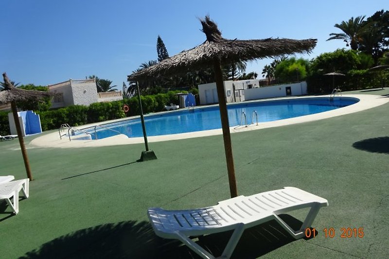 Spacious pool area, usable for all guests / residents, of Urb. Puerta de Rey.