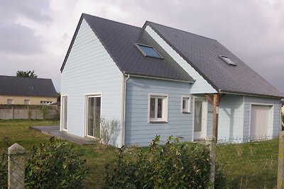 La maison bleue am Meer