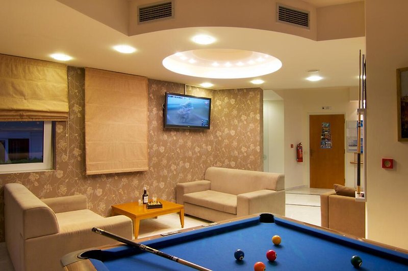 Lounge and pool table in the reception area