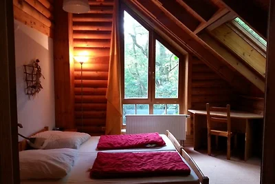 Casa di legno sul lago