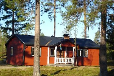 Haus am Lachsfluß in Lappland